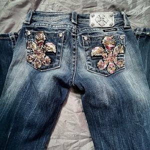 Miss Me Skinny Size 12 (girls) jeans with decorative pockets.